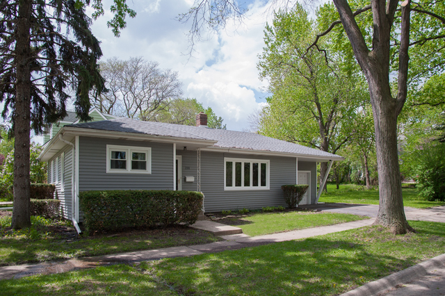 231 East Harrison Road Lombard, IL 60148 - Photo 1 of 16 a view of a house with a yard