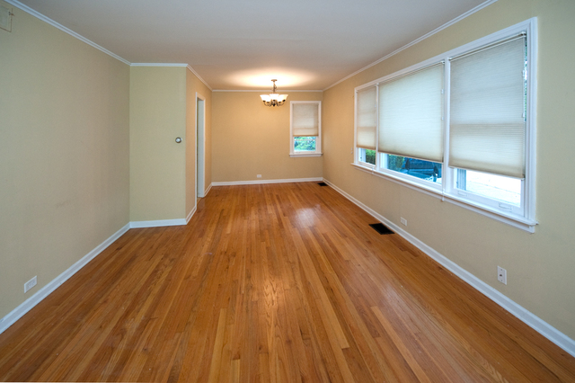 231 East Harrison Road Lombard, IL 60148 - Photo 7 of 16 a view of hallway with wooden floor