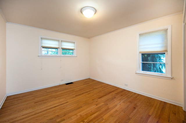 231 East Harrison Road Lombard, IL 60148 - Photo 10 of 16 wooden floor in an empty room