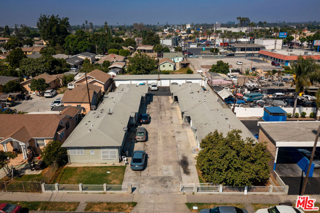 1307 East Peck Street Compton, CA 90221 - Photo 1 of 9 an aerial view of residential houses with outdoor space