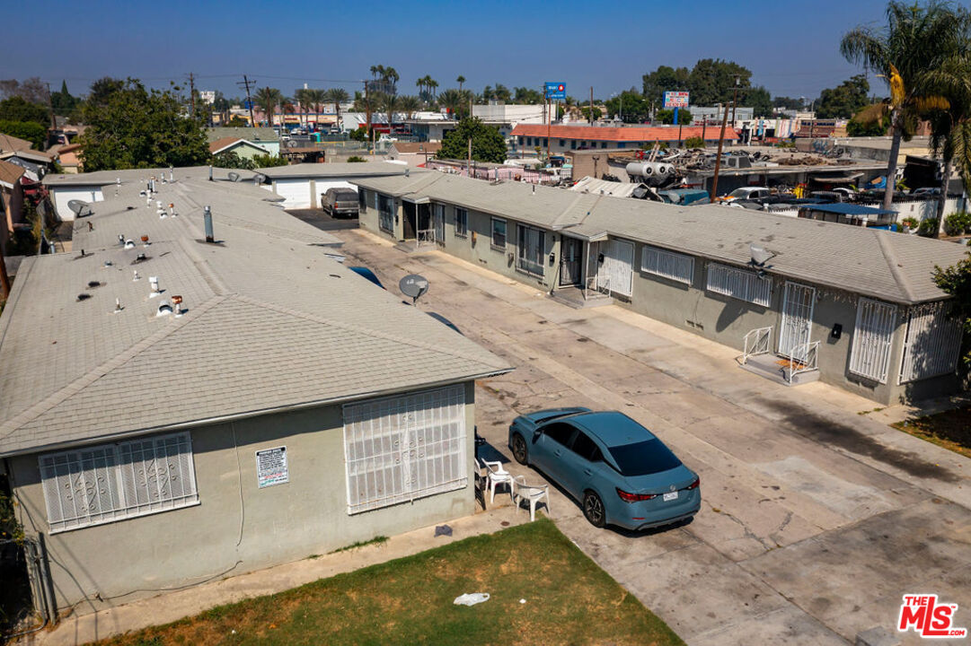 1307 East Peck Street Compton, CA 90221 - Photo 4 of 9 a car parked in front of a house