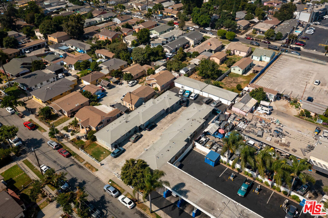 1307 East Peck Street Compton, CA 90221 - Photo 7 of 9 an aerial view of a city with lots of residential buildings