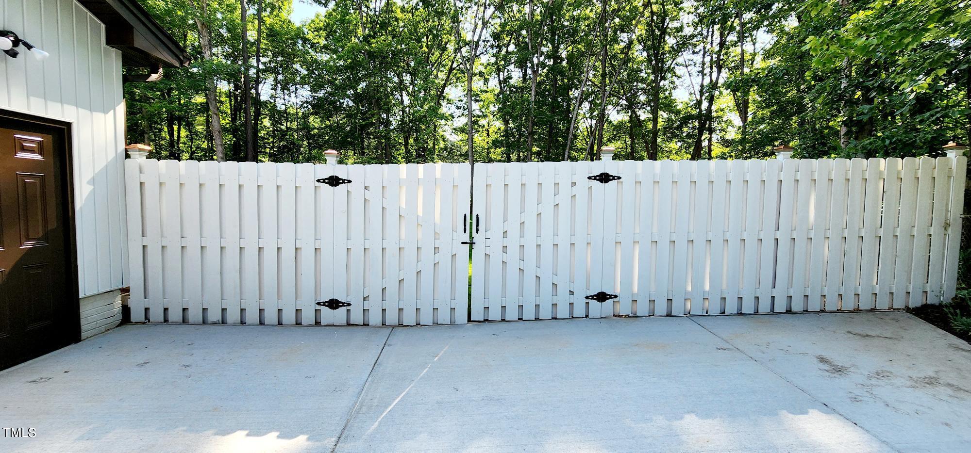 701 Sandy Ridge Court Raleigh, NC 27615 - Photo 36 of 53 Double Gate for Access to Back Yard