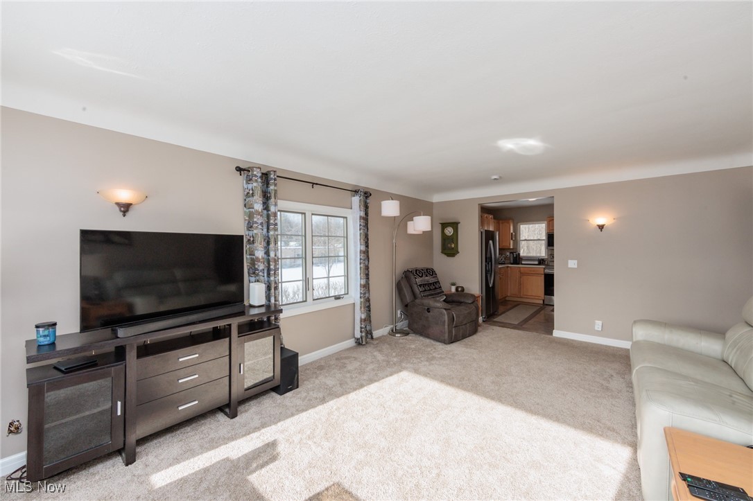 7702 West Pleasant Valley Road Parma, OH 44129 - Photo 11 of 50 Well appointed living room off of the kitchen