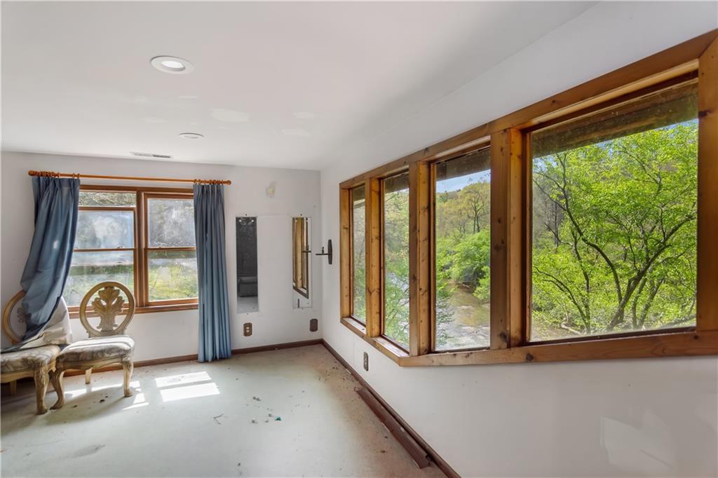 80 Riverbend Circle Ellijay, GA 30536 - Photo 20 of 32 a view of a room with a large window and lake view