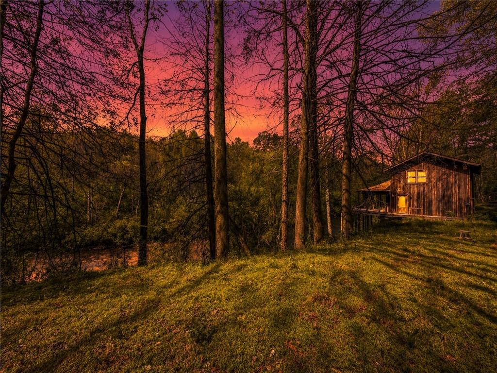 80 Riverbend Circle Ellijay, GA 30536 - Photo 7 of 32 a backyard of a house with trees