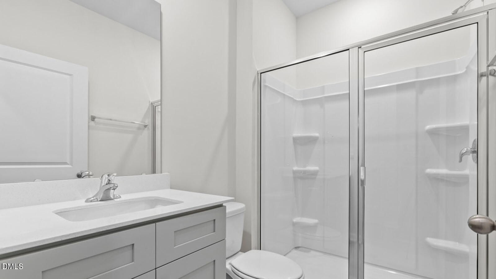 4027 Apollo Lane Snow Camp, NC 27349 - Photo 15 of 32 a bathroom with a sink toilet and shower