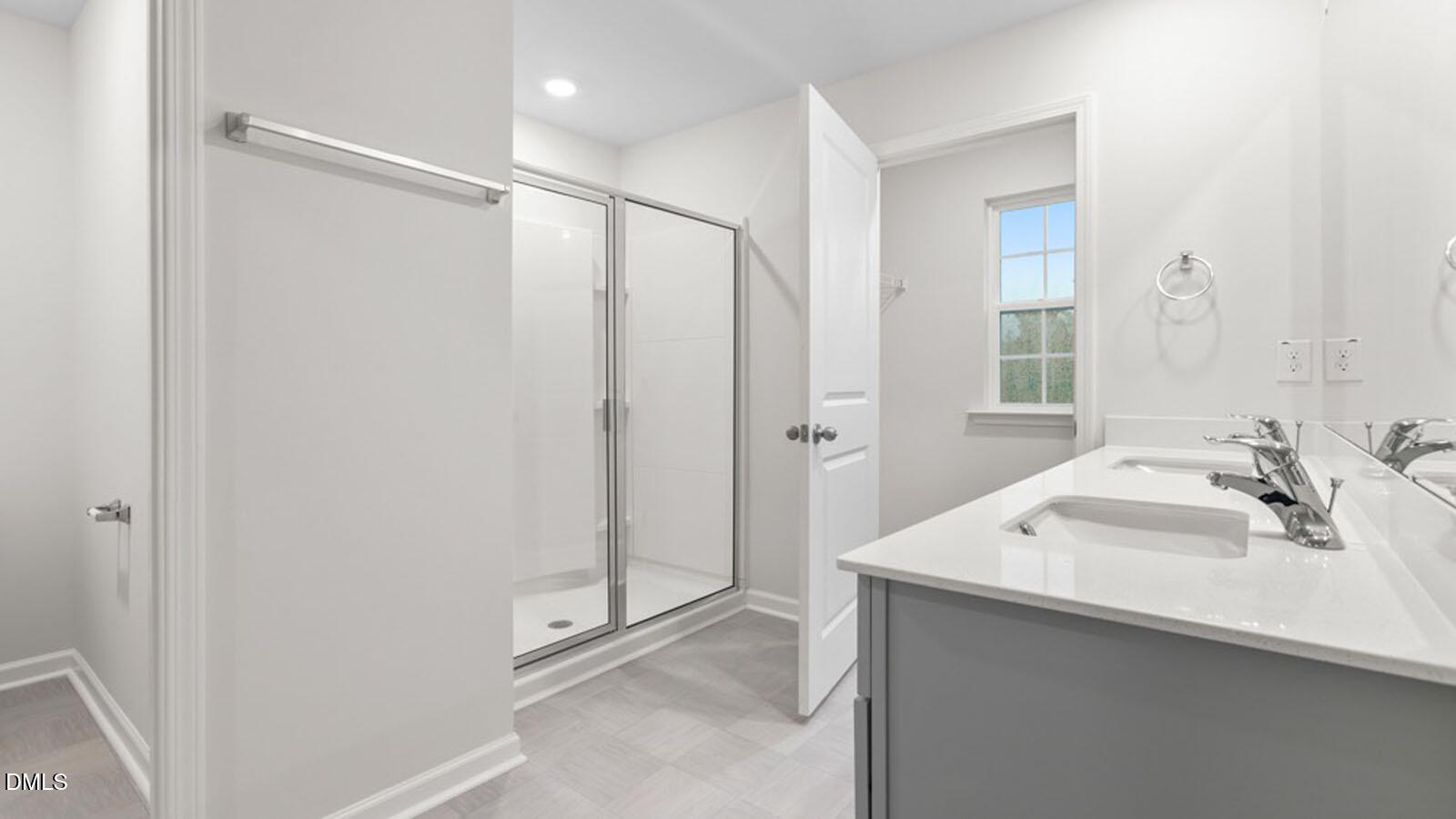 4027 Apollo Lane Snow Camp, NC 27349 - Photo 20 of 32 a bathroom with a shower sink and mirror