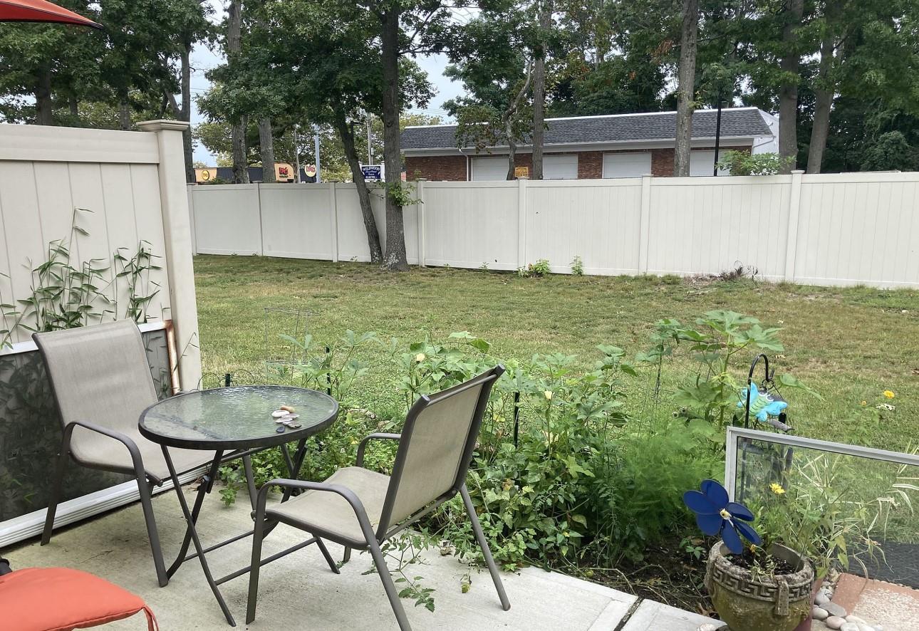 51 Rocky Point Yaphank Road, Unit 5 Rocky Point, NY 11778 - Photo 15 of 17 View of yard