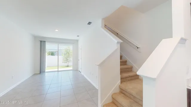 a view of an entryway with staircase