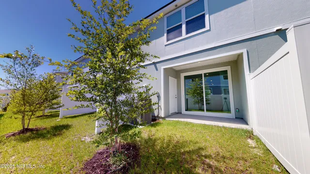 a view of a house with a swimming pool