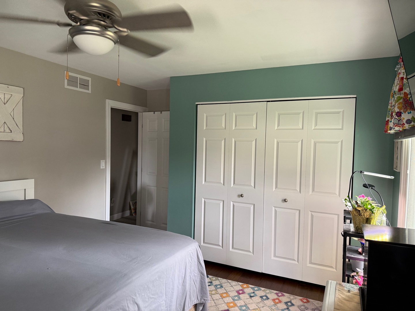 921 4h Road Ottawa, IL 61350 - Photo 10 of 28 a bedroom with a bed and a chandelier fan
