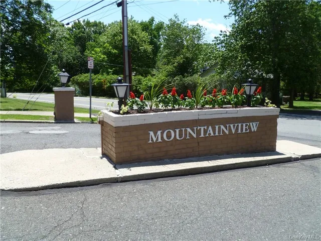 a view of street with sign board