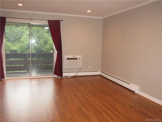 a bathroom with a sink mirror vanity and toilet