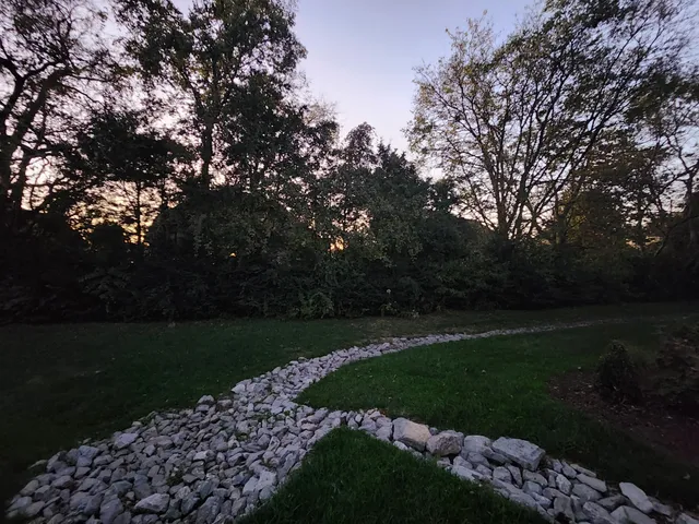 a view of a golf course with a lake