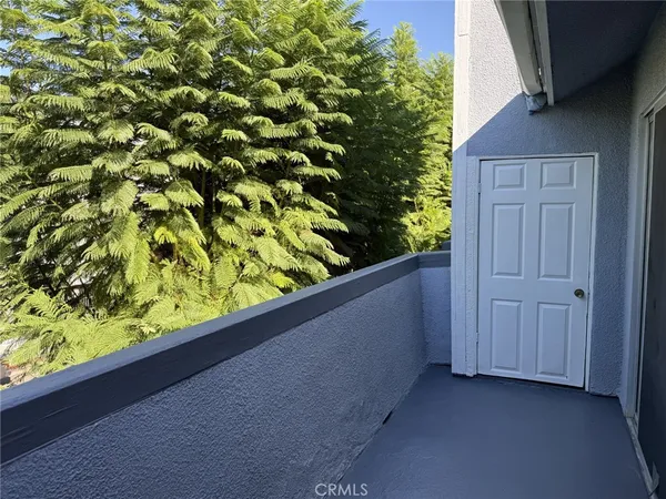 a view of a garden from a balcony