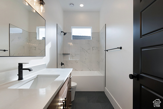 3145 Snow Cyn Road Hurricane, UT 84737 - Photo 21 of 38 Full bath with vanity, tile patterned flooring, and shower combination