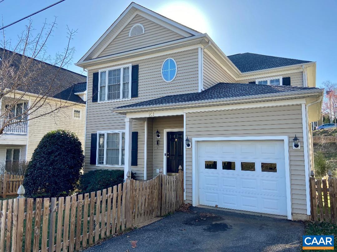911 Raymond Road Charlottesville, VA 22902 - Photo 1 of 24 a front view of house with a yard