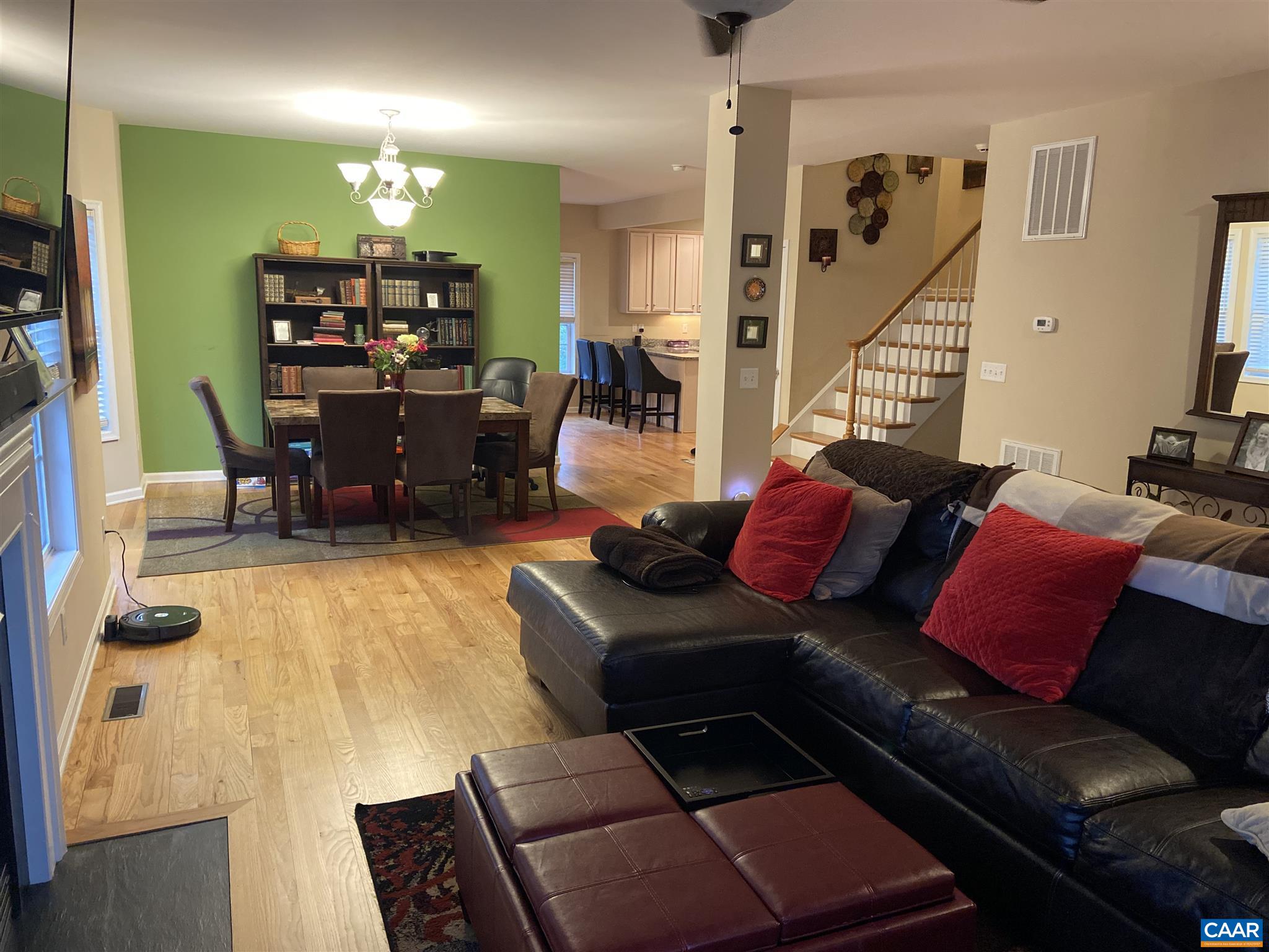 911 Raymond Road Charlottesville, VA 22902 - Photo 8 of 24 a living room with furniture and wooden floor
