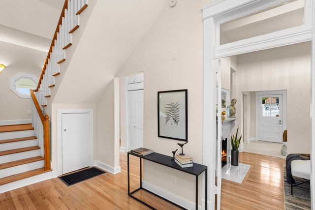 a bedroom with a bed couch and window