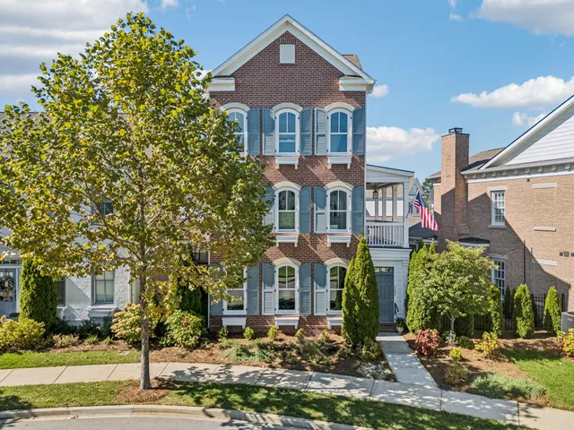 an aerial view of a house with outdoor space