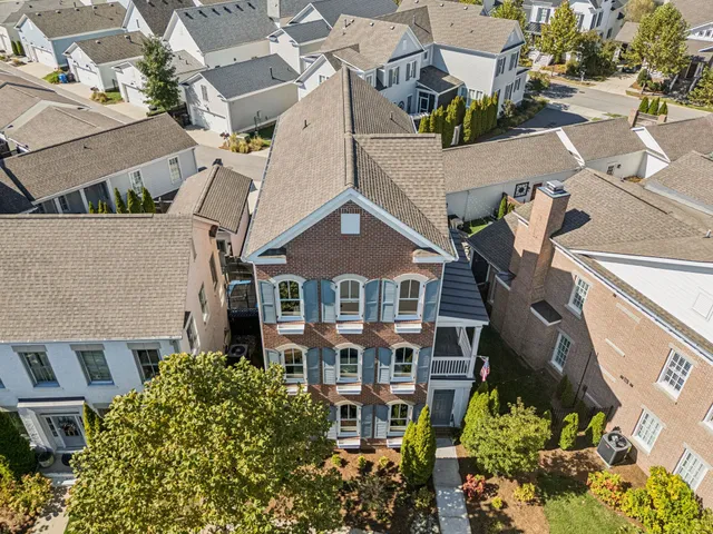 an aerial view of a house with a outdoor space