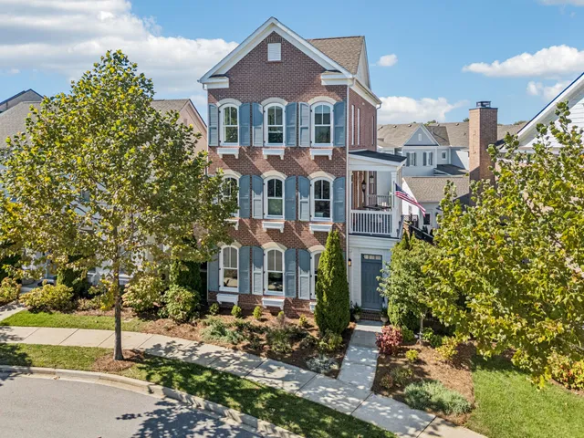an aerial view of a house with outdoor space