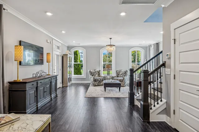 a dining table with chairs and wooden floor