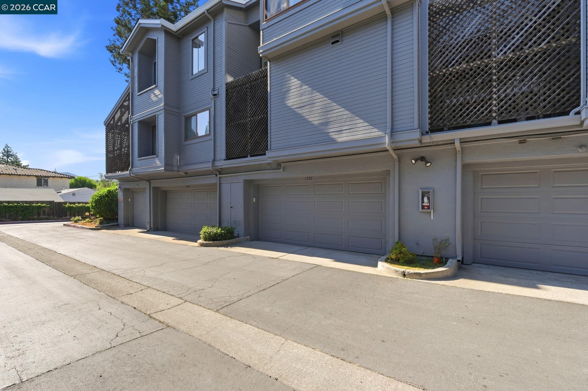 1707 Geary Road Walnut Creek, CA 94597 - Photo 40 of 43 a view of a building with a street