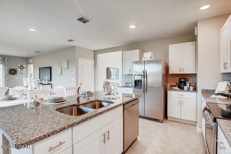 1362 Cork Drive Ormond Beach, FL 32174 - Photo 5 of 13 4 kitchen