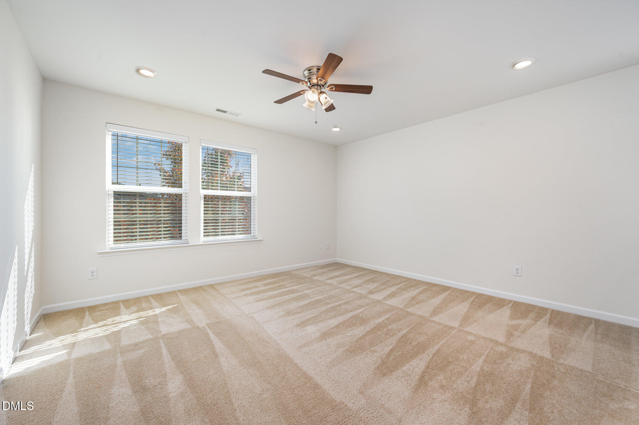 104 Oak Rise Lane Fuquay-Varina, NC 27526 - Photo 13 of 29 a view of an empty room with a window