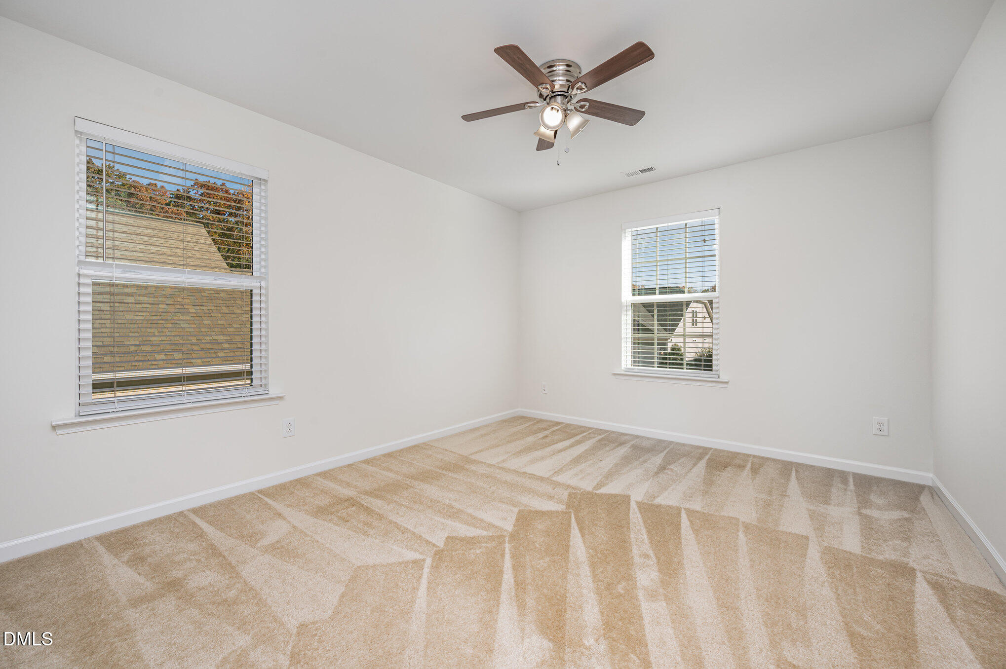 104 Oak Rise Lane Fuquay-Varina, NC 27526 - Photo 17 of 29 a view of an empty room with a window