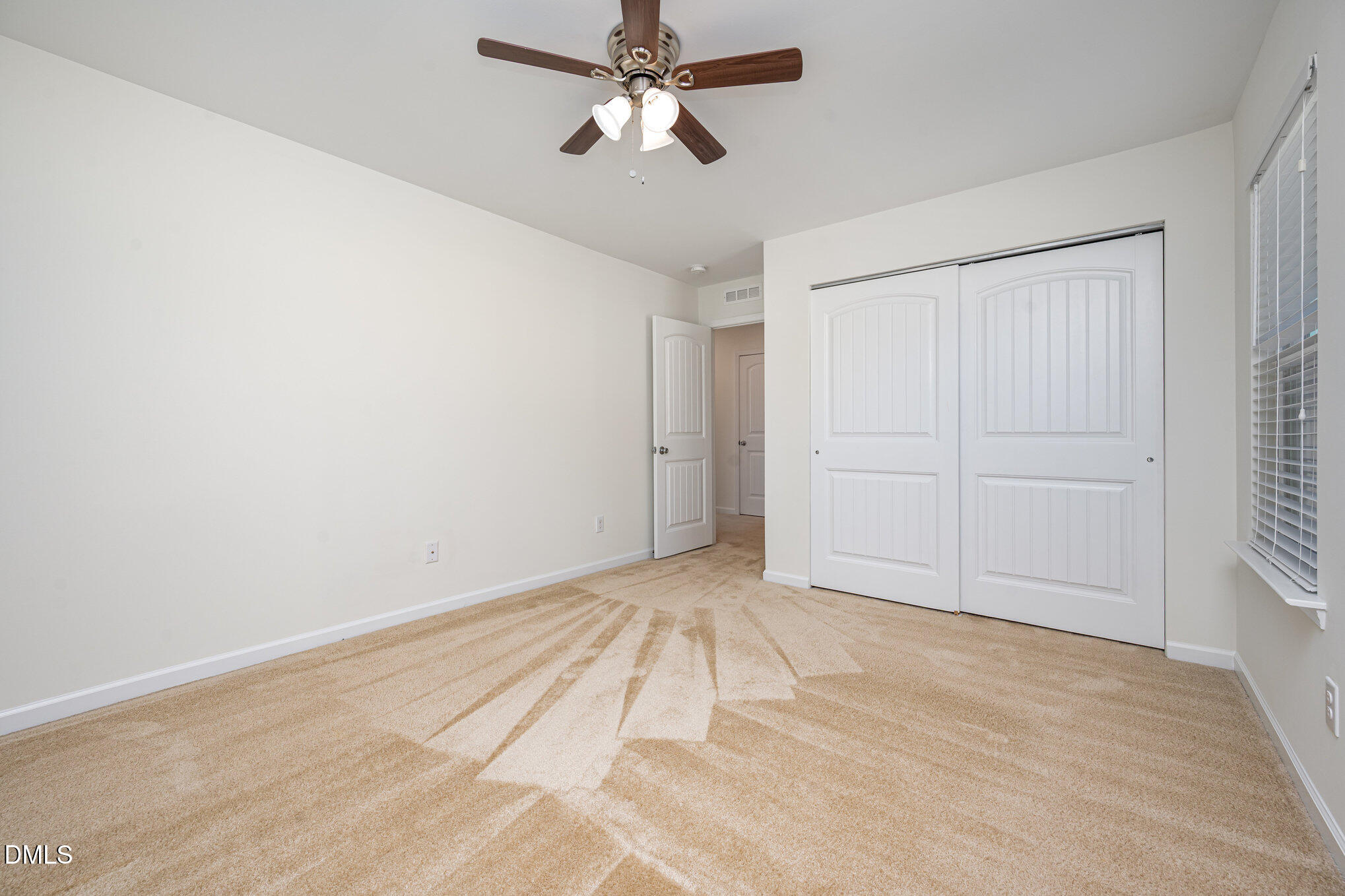104 Oak Rise Lane Fuquay-Varina, NC 27526 - Photo 18 of 29 a view of empty room with ceiling fan