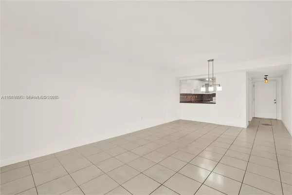 a view of a room with an empty space