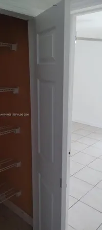 a utility room with washer and dryer