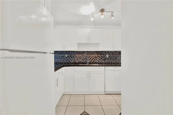 a view of a utility room with closet