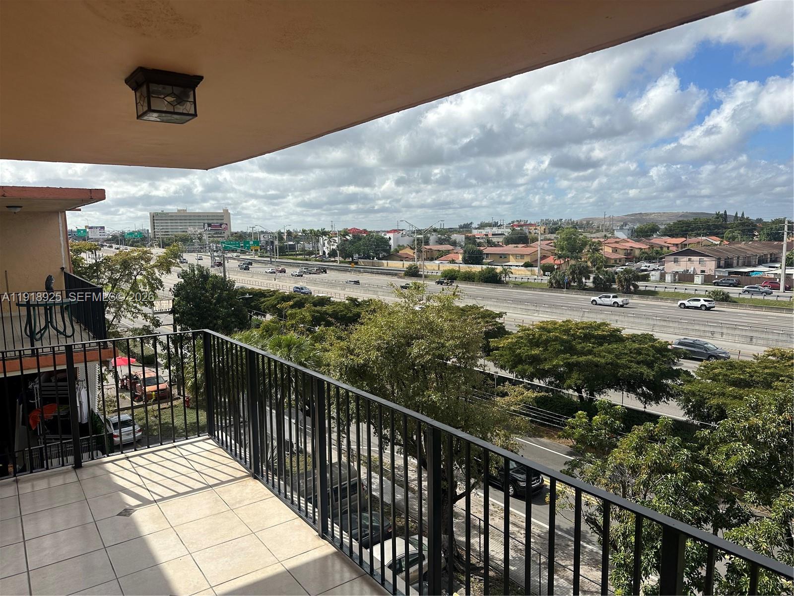 1990 West 56th Street, Unit 1407 Hialeah, FL 33012 - Photo 26 of 28 a view of city from balcony