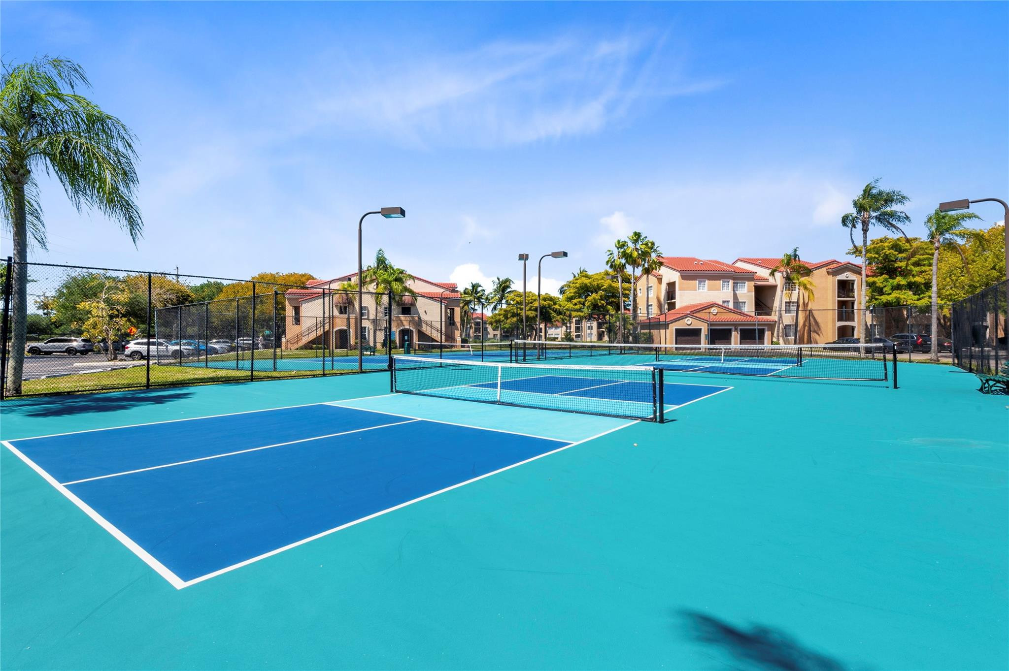 2133 Renaissance Boulevard, Unit 205 Miramar, FL 33025 - Photo 22 of 24 a view of a tennis court