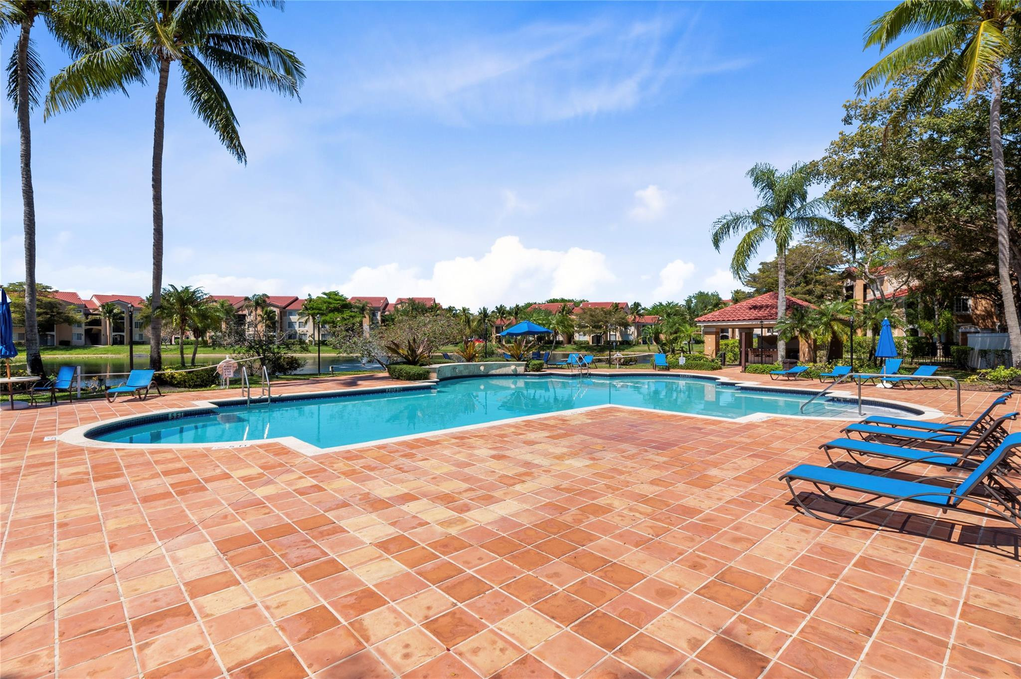 2133 Renaissance Boulevard, Unit 205 Miramar, FL 33025 - Photo 23 of 24 a view of swimming pool with lounge chair