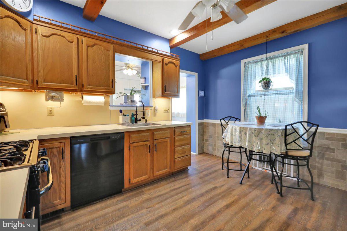 20 Myrtle Avenue Reading, PA 19606 - Photo 11 of 28 a kitchen with a table chairs and wooden floor