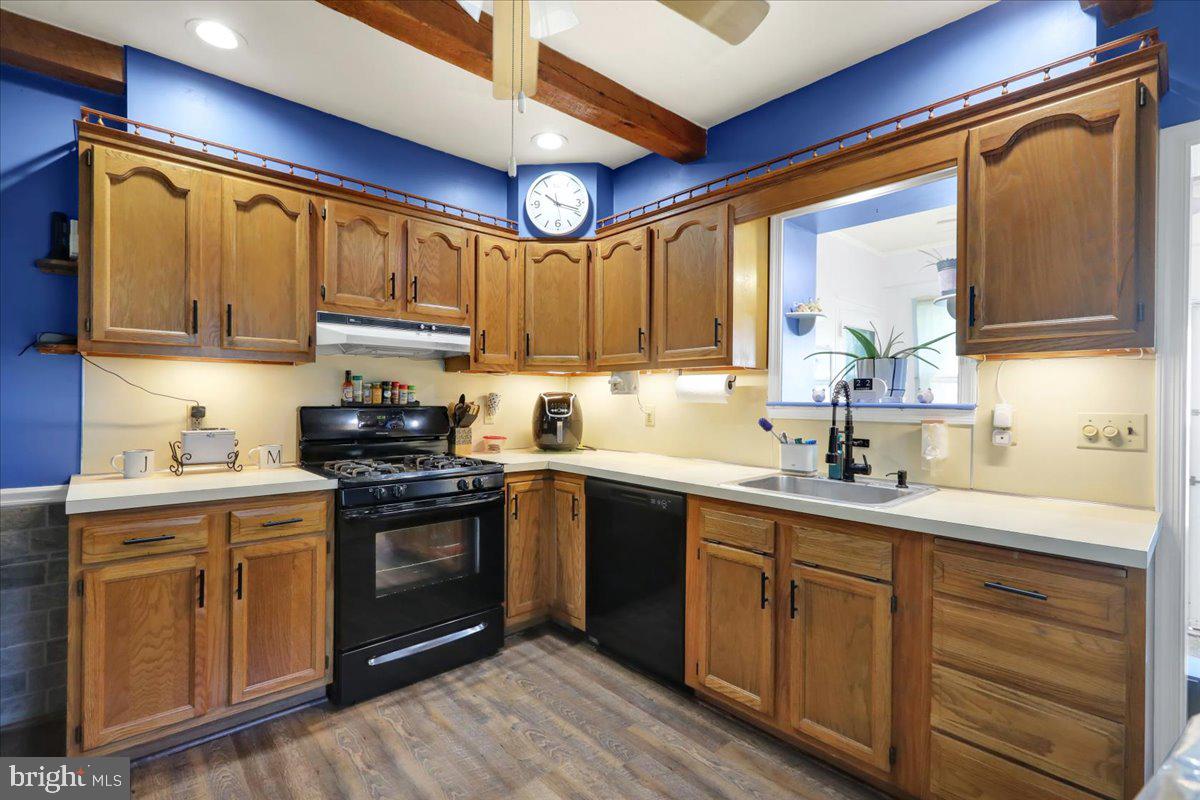20 Myrtle Avenue Reading, PA 19606 - Photo 12 of 28 a kitchen with a sink stove and cabinets