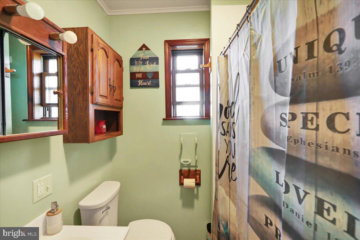 20 Myrtle Avenue Reading, PA 19606 - Photo 16 of 28 a bathroom with a toilet sink and mirror
