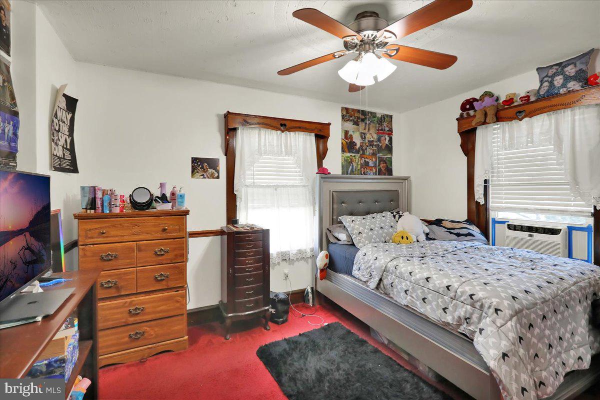 20 Myrtle Avenue Reading, PA 19606 - Photo 17 of 28 a bedroom with a bed and a dresser in it