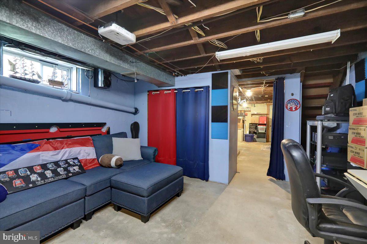 20 Myrtle Avenue Reading, PA 19606 - Photo 24 of 28 a living room with furniture and a flat screen tv