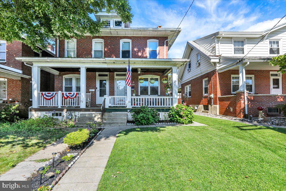 20 Myrtle Avenue Reading, PA 19606 - Photo 5 of 28 front view of a brick house with a yard