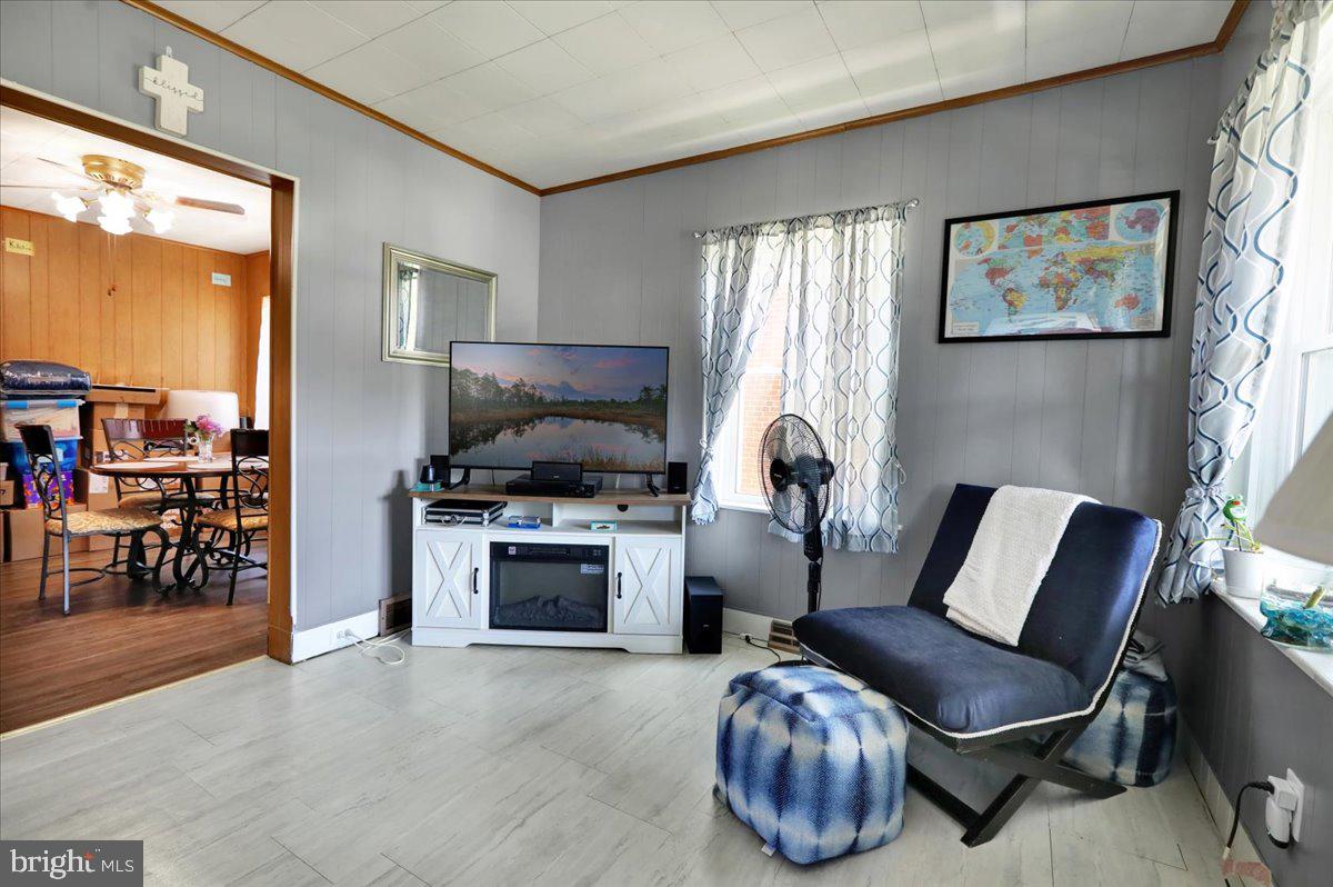 20 Myrtle Avenue Reading, PA 19606 - Photo 7 of 28 a living room with furniture and a flat screen tv