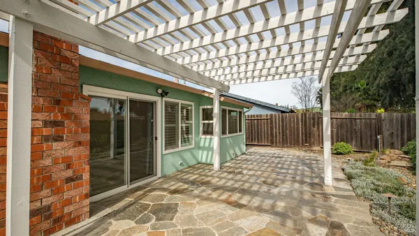 a view of a porch with a backyard