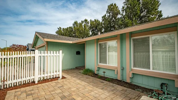 a front view of a house with a porch