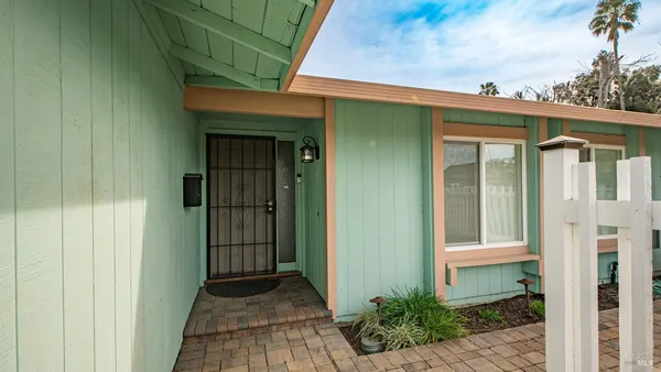 a front view of a house with a porch