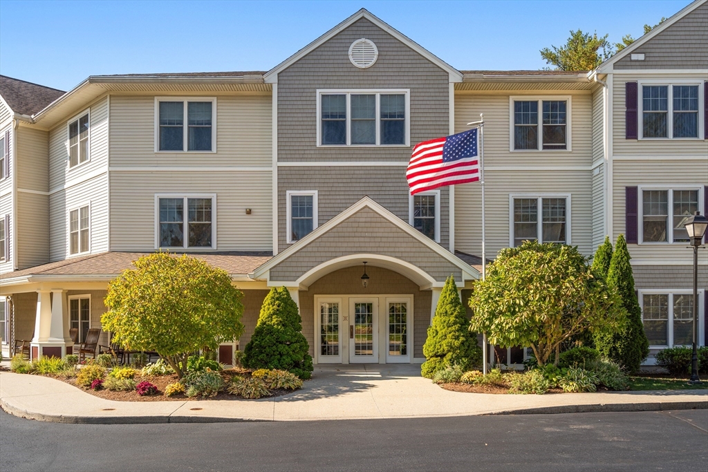 7 Crescent Way, Unit 105 Sturbridge, MA 01518 - Photo 2 of 35 a front view of a house